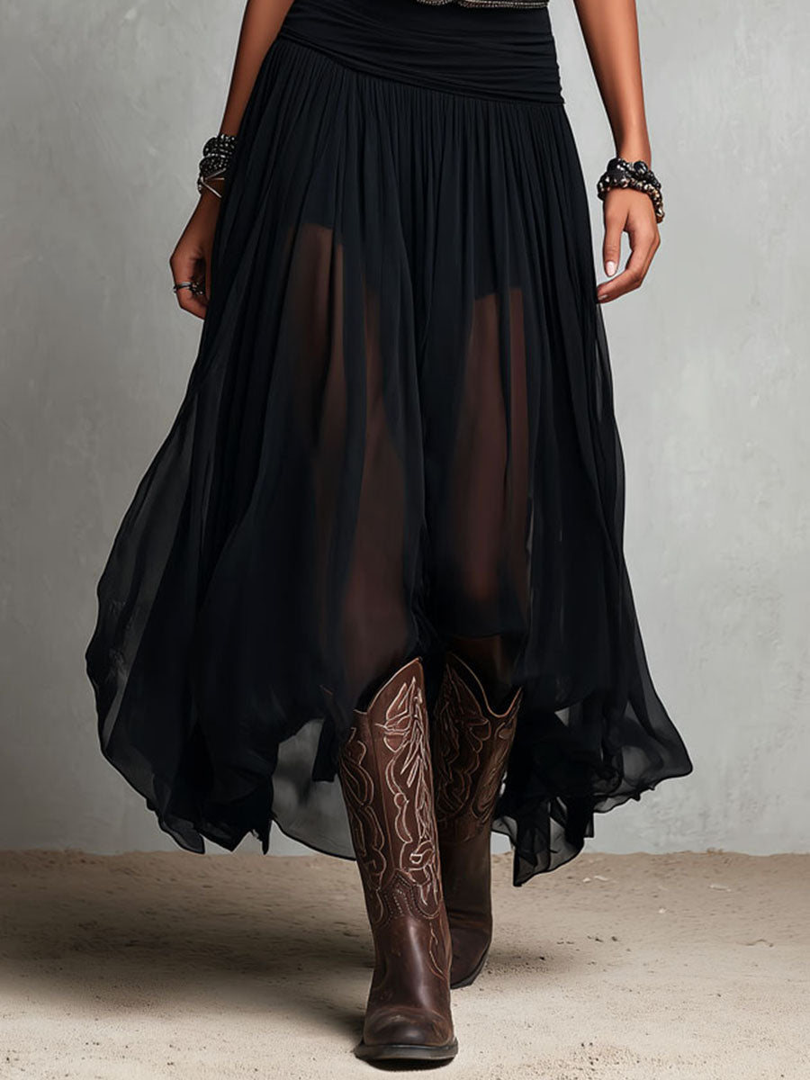 Vestito maxi nero elasticizzato in stile boho-western con gonna trasparente