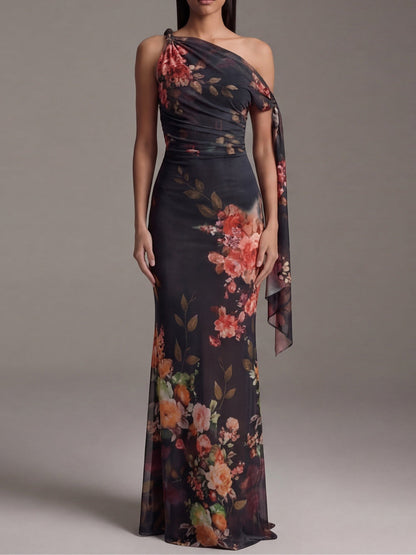 Vestito lungo nero in chiffon monospalla con stampa e pieghe