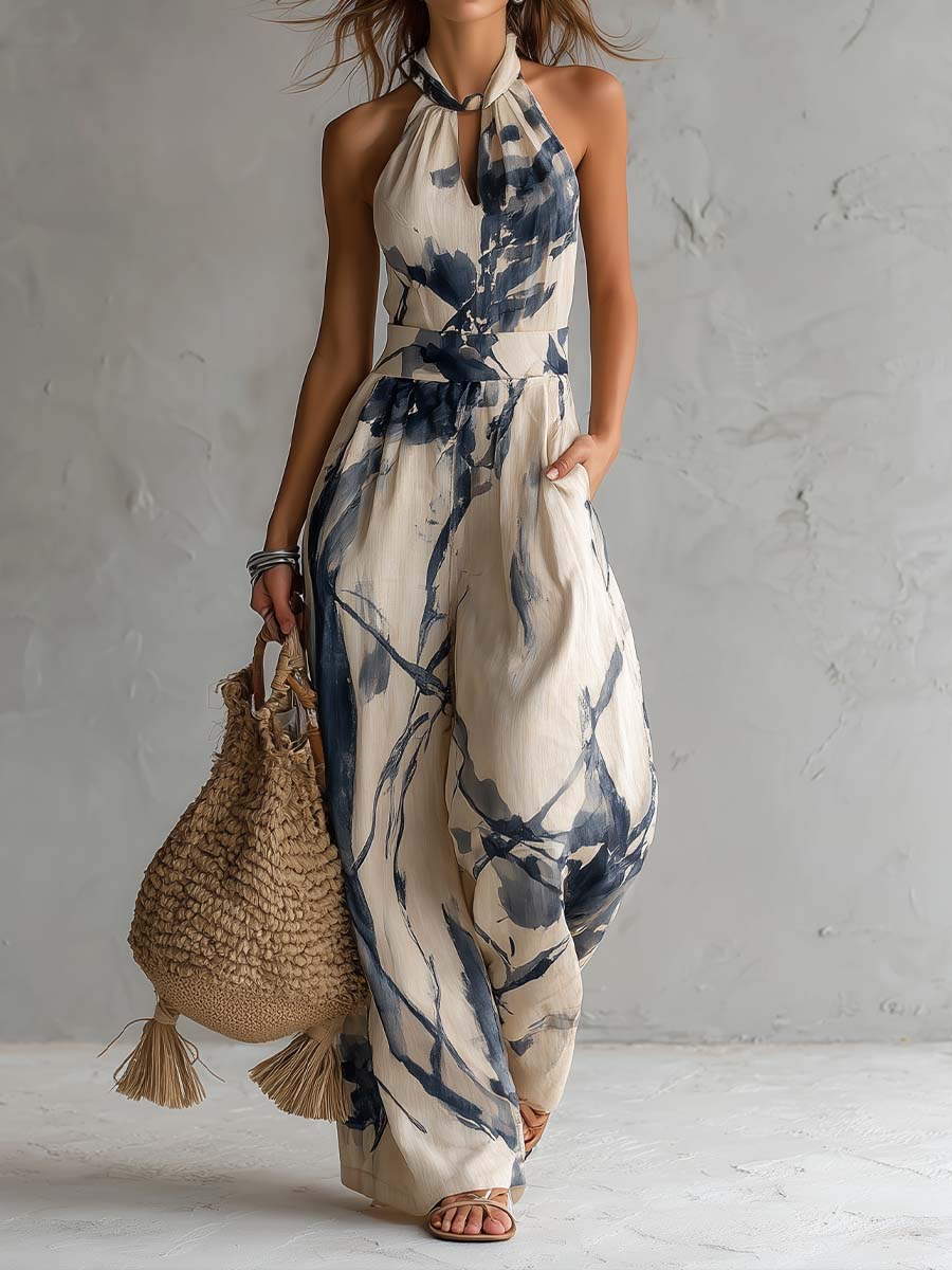 Tuta con scollo halterneck, stampa effetto lavaggio inchiostro, gamba ampia, con tasche