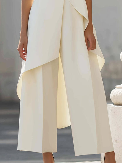 Set composto da top senza maniche a strati asimmetrico e pantaloni a gamba larga