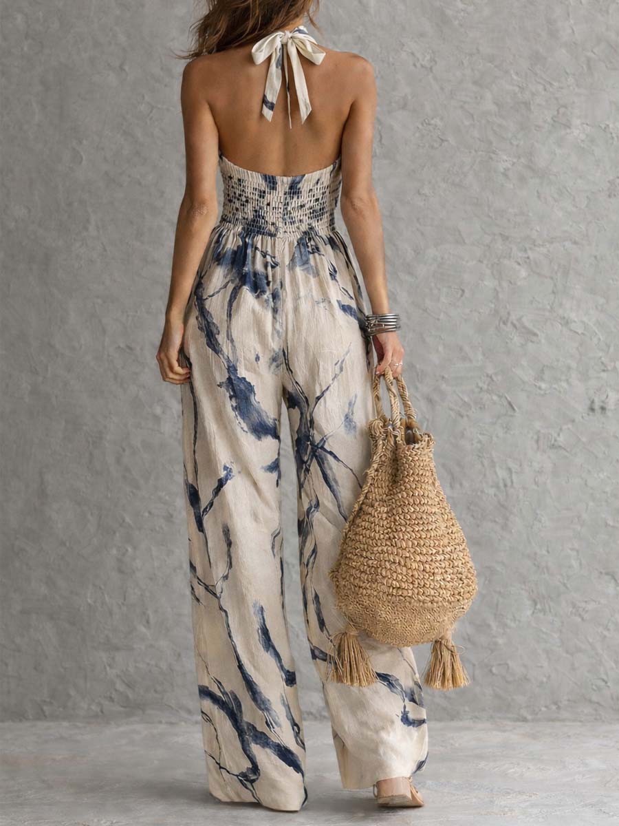 Tuta con scollo halterneck, stampa effetto lavaggio inchiostro, gamba ampia, con tasche