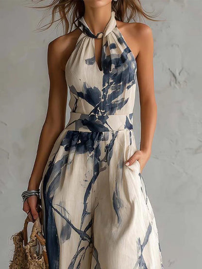 Tuta con scollo halterneck, stampa effetto lavaggio inchiostro, gamba ampia, con tasche