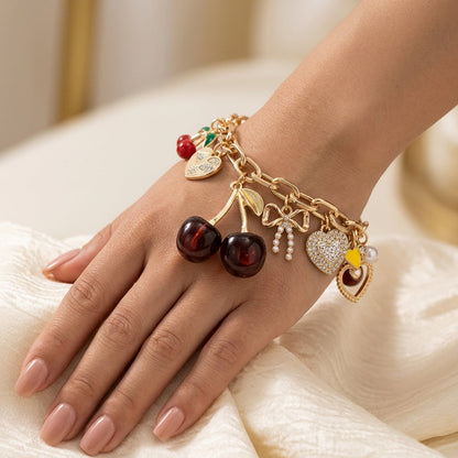 Bracciale con ciondolo a forma di ciliegia rossa