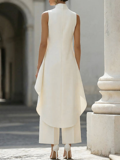 Set composto da top senza maniche a strati asimmetrico e pantaloni a gamba larga