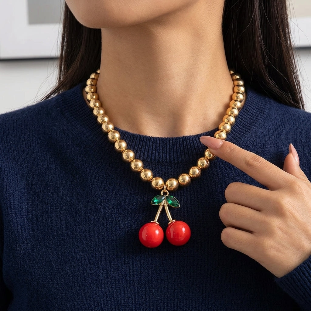 Collana con pendente a forma di ciliegia