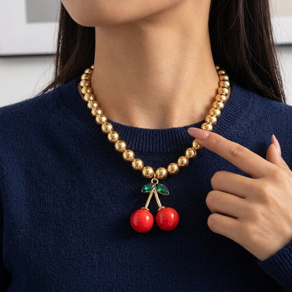 Collana con pendente a forma di ciliegia