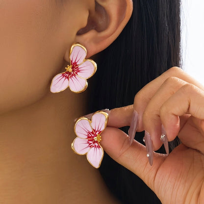 Orecchini con petali di farfalla
