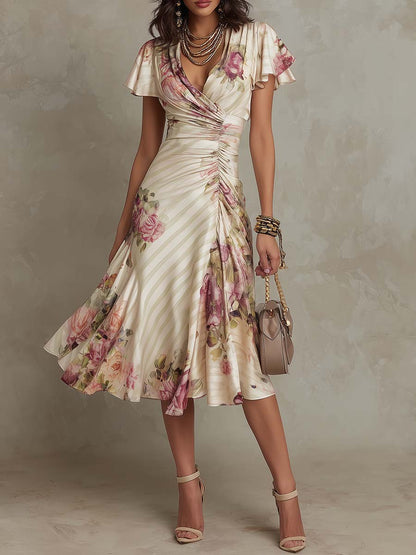 Alba | Elegante abito midi avvolgente con motivo floreale e ruches