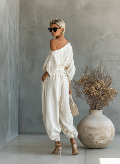 Set in lino avorio da donna con top a spalle scoperte e pantaloni a gamba affusolata • S1