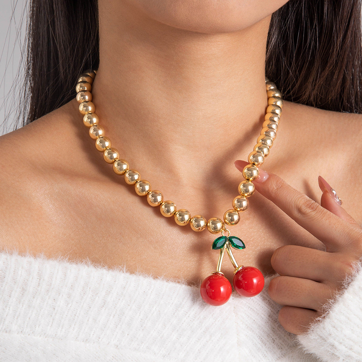 Collana con pendente a forma di ciliegia