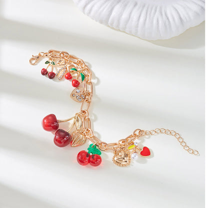 Bracciale con ciondolo a forma di ciliegia rossa
