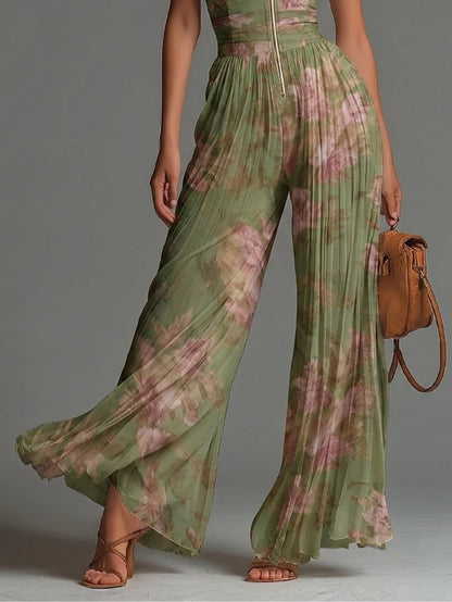 Tuta in chiffon verde a stampa floreale, scollo a V, senza maniche, con zip frontale, con pieghe, a gamba larga