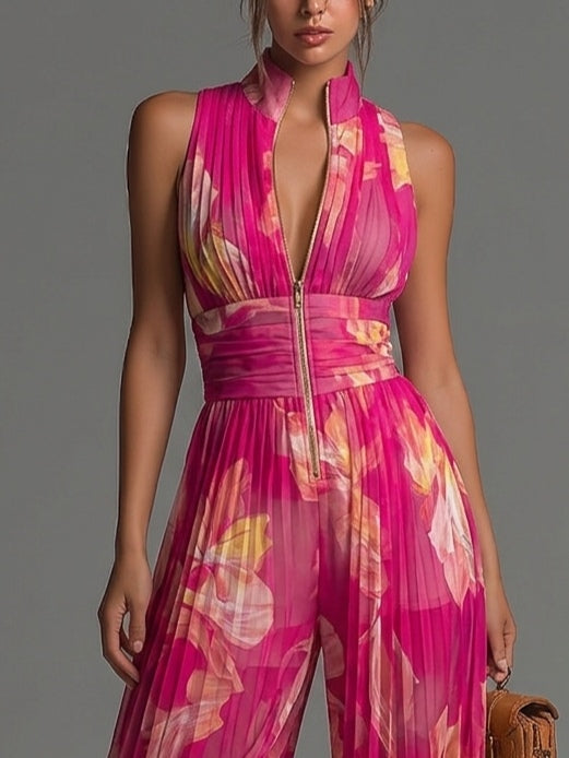 Tuta in chiffon plissettata con stampa floreale fucsia, senza maniche, con cerniera, a gamba ampia
