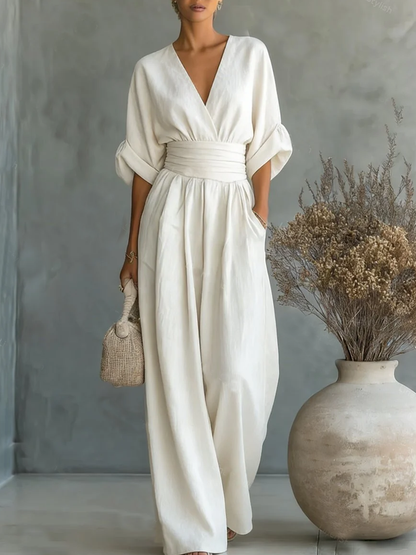 Tuta elegante con scollo a V e vita alta • S1