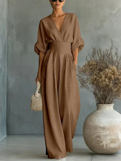 Tuta elegante con scollo a V e vita alta • S1