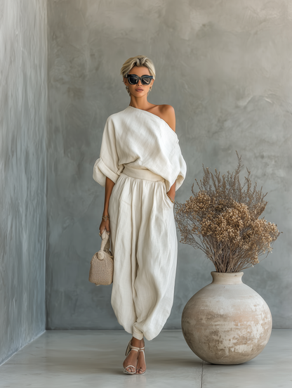Set in lino avorio da donna con top a spalle scoperte e pantaloni a gamba affusolata • S1